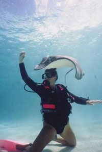 Underwater Photo - Female Scuba Diver with Sting Ray