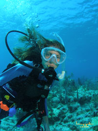 underwater modeling for her dad in Key Largo